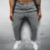 Men's Casual Solid Color Elastic Waist Loose Sports Pants 12510361M sold by Manly