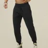 Men's Solid Color Elastic Waist Sports Pants 65821523Z sold by Manly