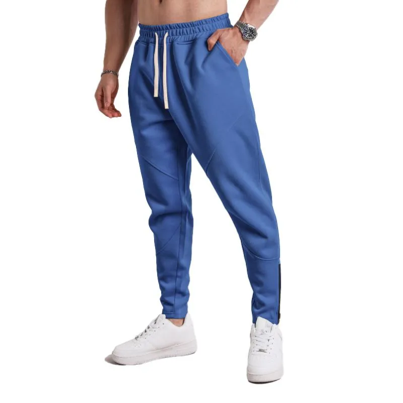 Men's Solid Loose Elastic Waist Zip Cuff Sports Pants 66967239Z sold by Manly