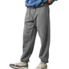 Men's Solid Color Loose Elastic Waist Sports Pants 70853486Z sold by Manly