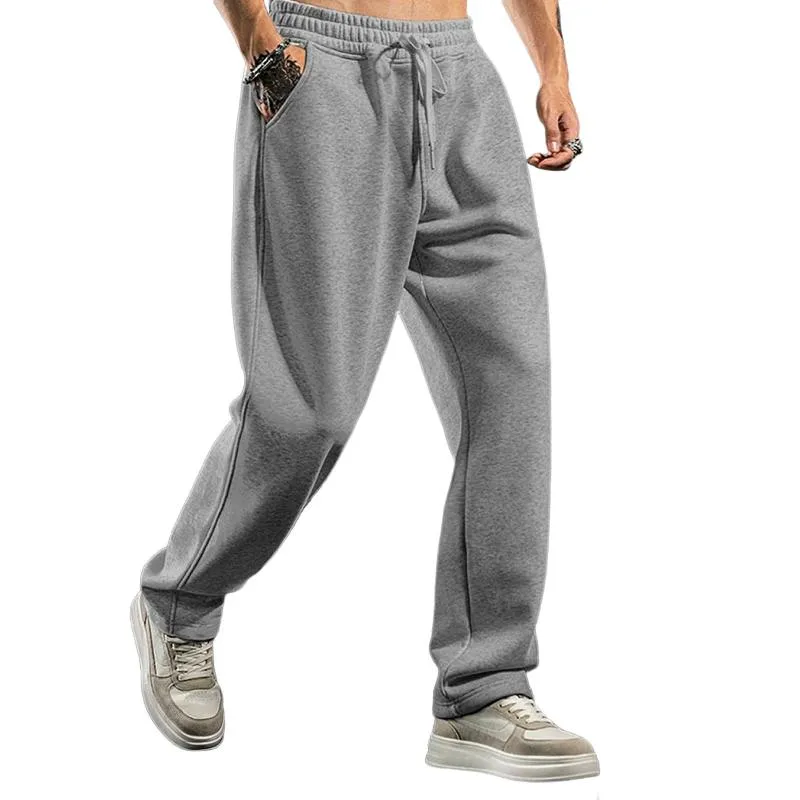 Men's Solid Color Loose Elastic Waist Sports Pants 57647138Z sold by Manly