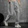 Men's Solid Color Loose Elastic Waist Sports Pants 57647138Z sold by Manly