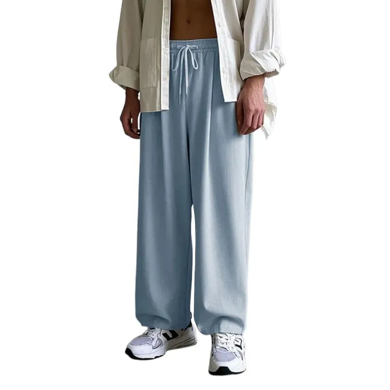 Men's Fashion Solid Color Elastic Waist Loose Casual Pants 79356635Z sold by Manly