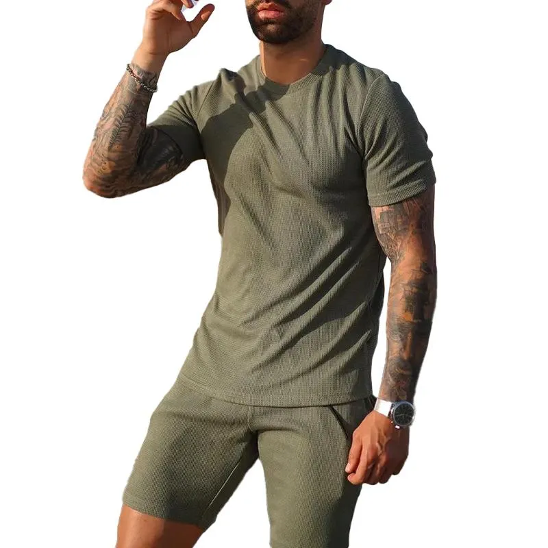 Men's Solid Loose Round Neck Short Sleeve T-shirt Shorts Set 86538669Z made by Manly
