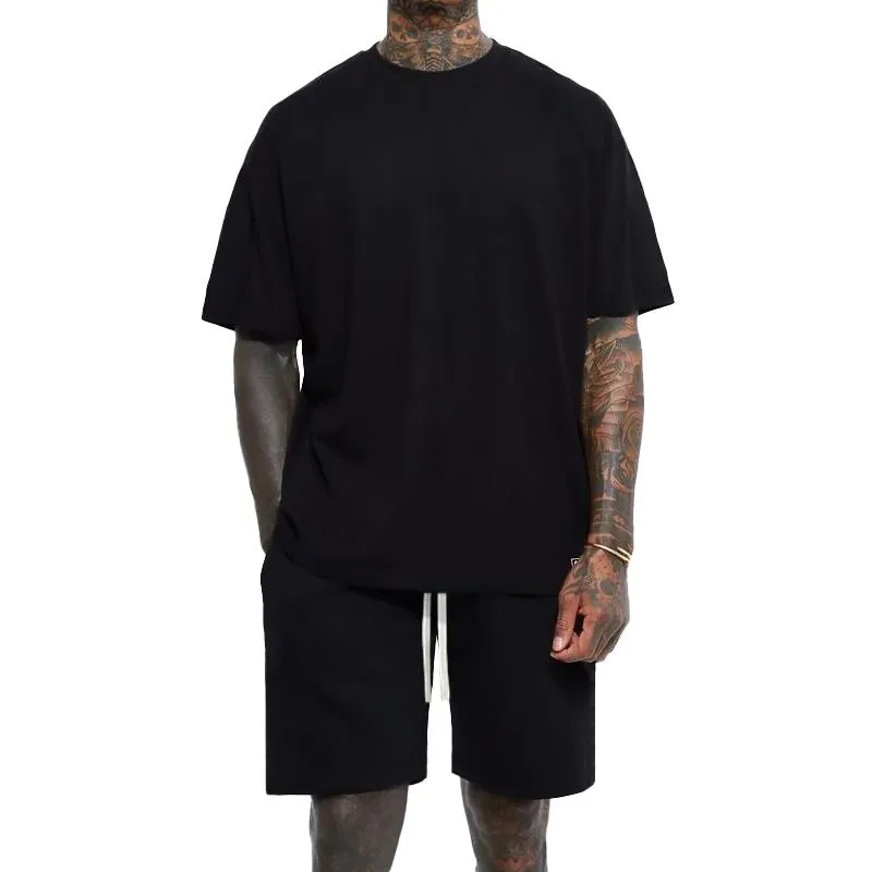 Men's Solid Loose Round Neck Short Sleeve T-shirt Shorts Set 58391456Z sold by Manly