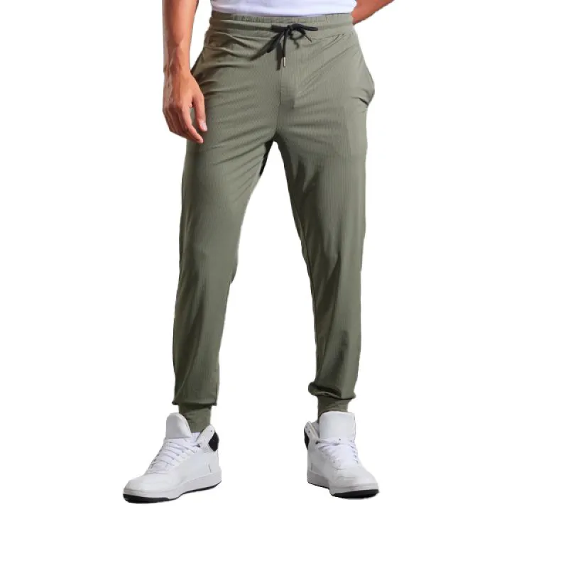 Men's Solid Loose High Elastic Casual Sports Pants 53995663Z sold by Manly