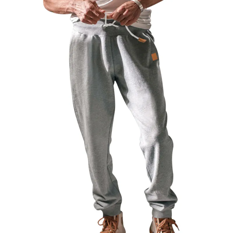 Men's Solid Elastic Waist Loose Sports Casual Pants 58989456Z sold by Manly