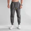 Men's Solid Color Loose Elastic Waist Sweatpants 85674025Z sold by Manly