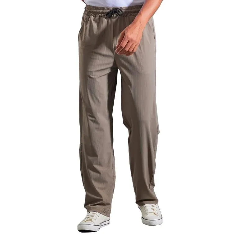 Men's Solid Loose High Elastic Casual Sports Pants 90071475Z sold by Manly