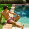 TropicalVibe Banana Leaves Swim Trunks sold by maamgic