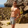 RetroRuse Camo Print Swim Trunks sold by maamgic