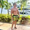 DreamScape Malaysia Swim Trunks sold by maamgic
