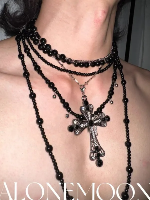 Multilayered Black Cross Pearl Long Necklace sold by PROD Bldg