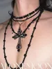 Multilayered Black Cross Pearl Long Necklace sold by PROD Bldg