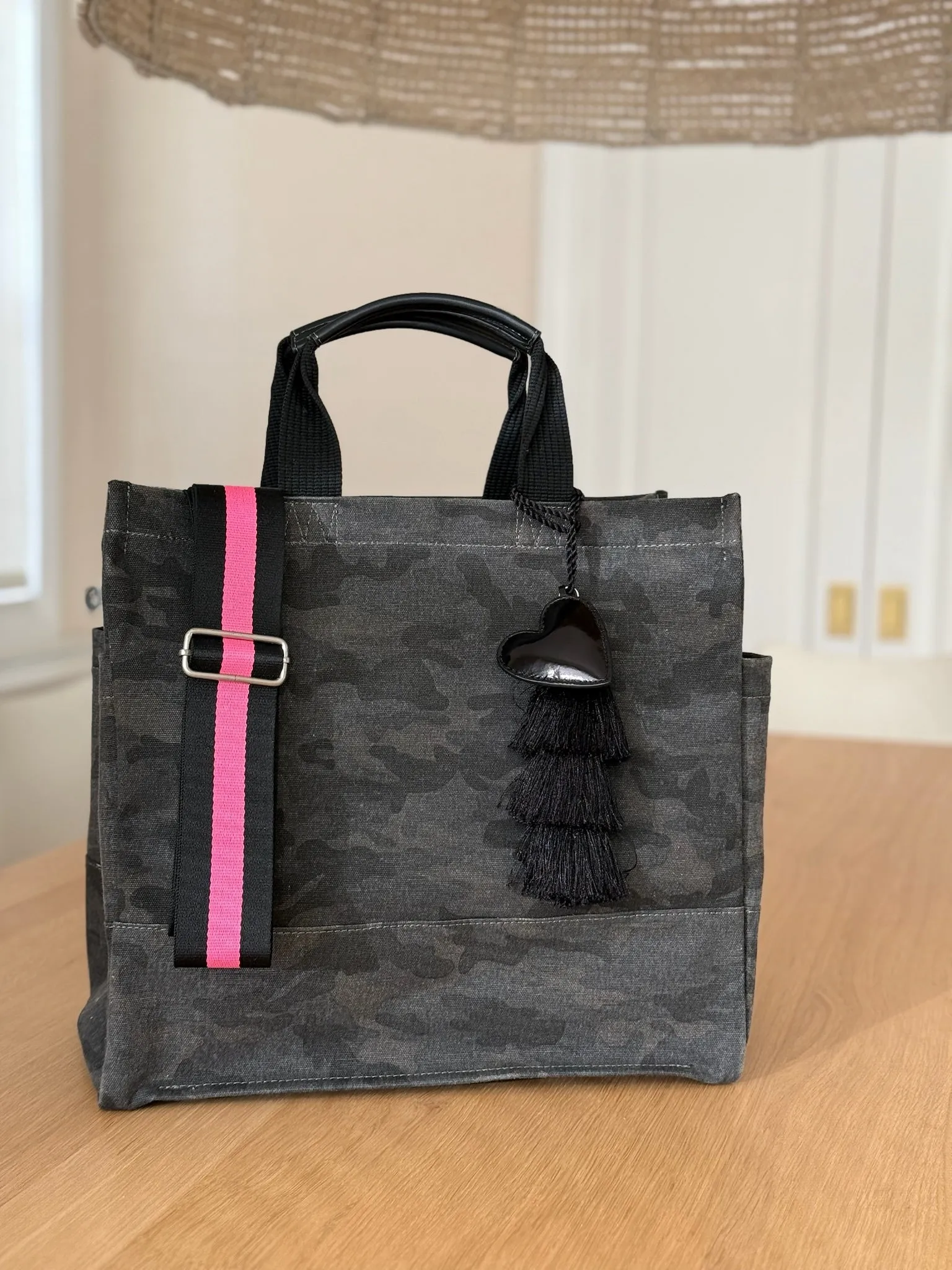 Stephanie's Pick: Black Camo Luxe North South Bag + FREE Black Tassel + FREE Black Heart Charm + FREE Black/Pink Stripe Strap sold by Quilted Koala