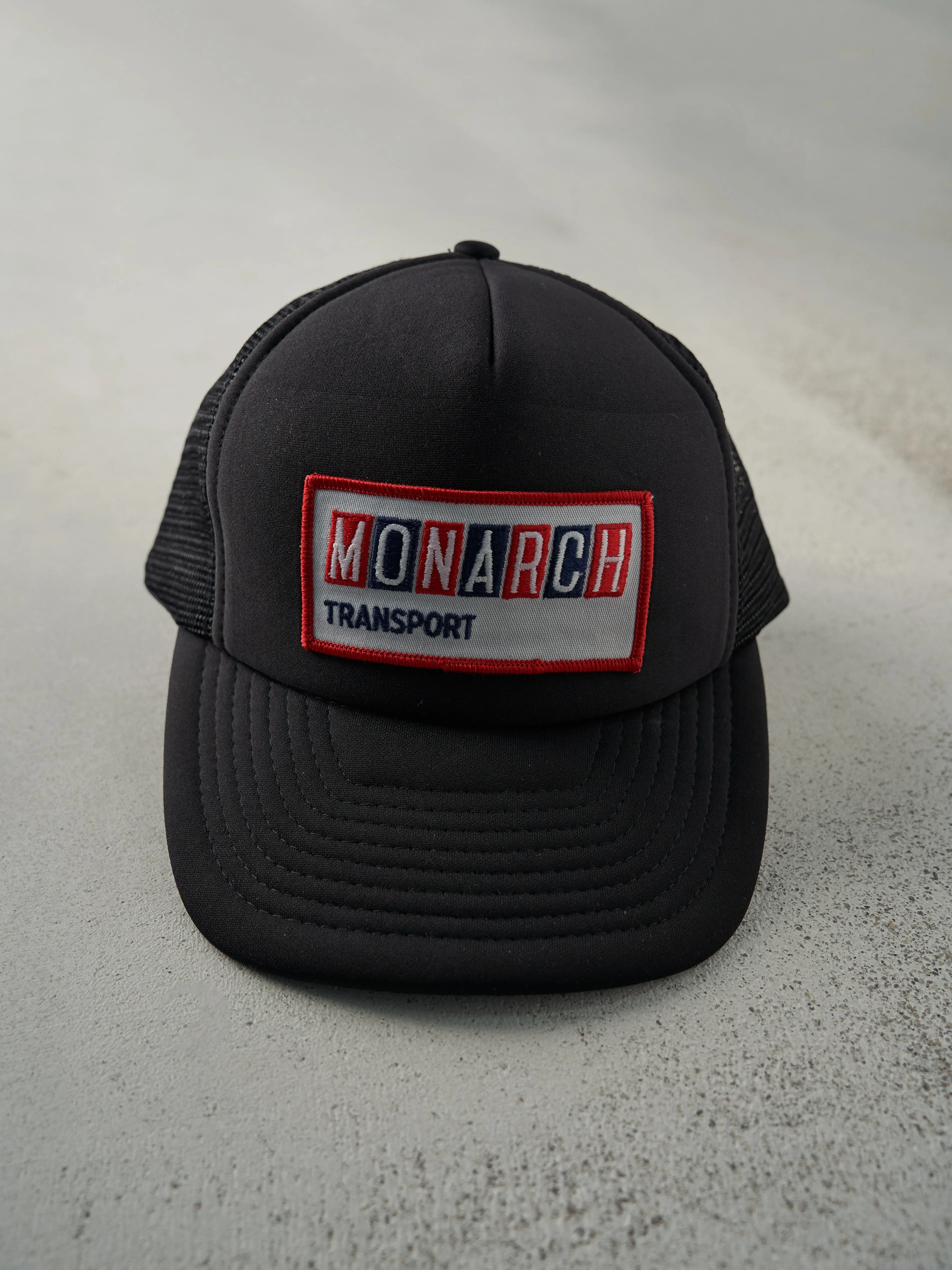 Vintage 90s Black Monarch Transport Foam Trucker Hat sold by Rebalance Vintage