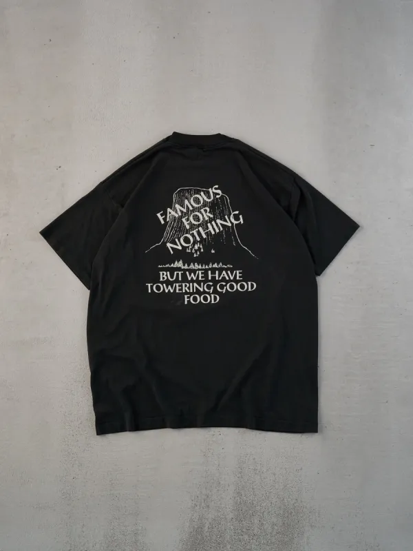 Vintage 90s Black Single Stitched "Famous For Nothing But We Have Towering Good Food" Tee (M/L) sold by Rebalance Vintage