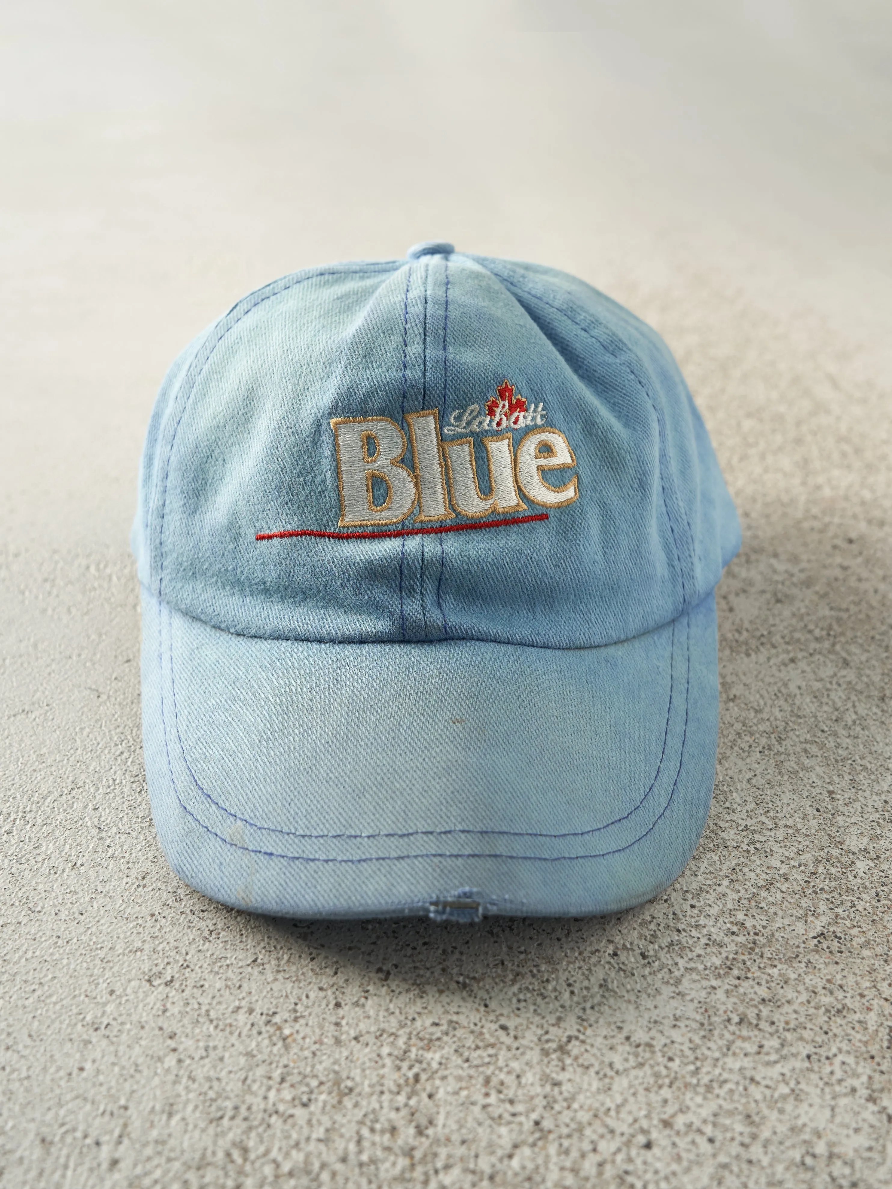 Vintage 90s Blue Labatt Blue Embroidered Leather Strap Back Hat sold by Rebalance Vintage