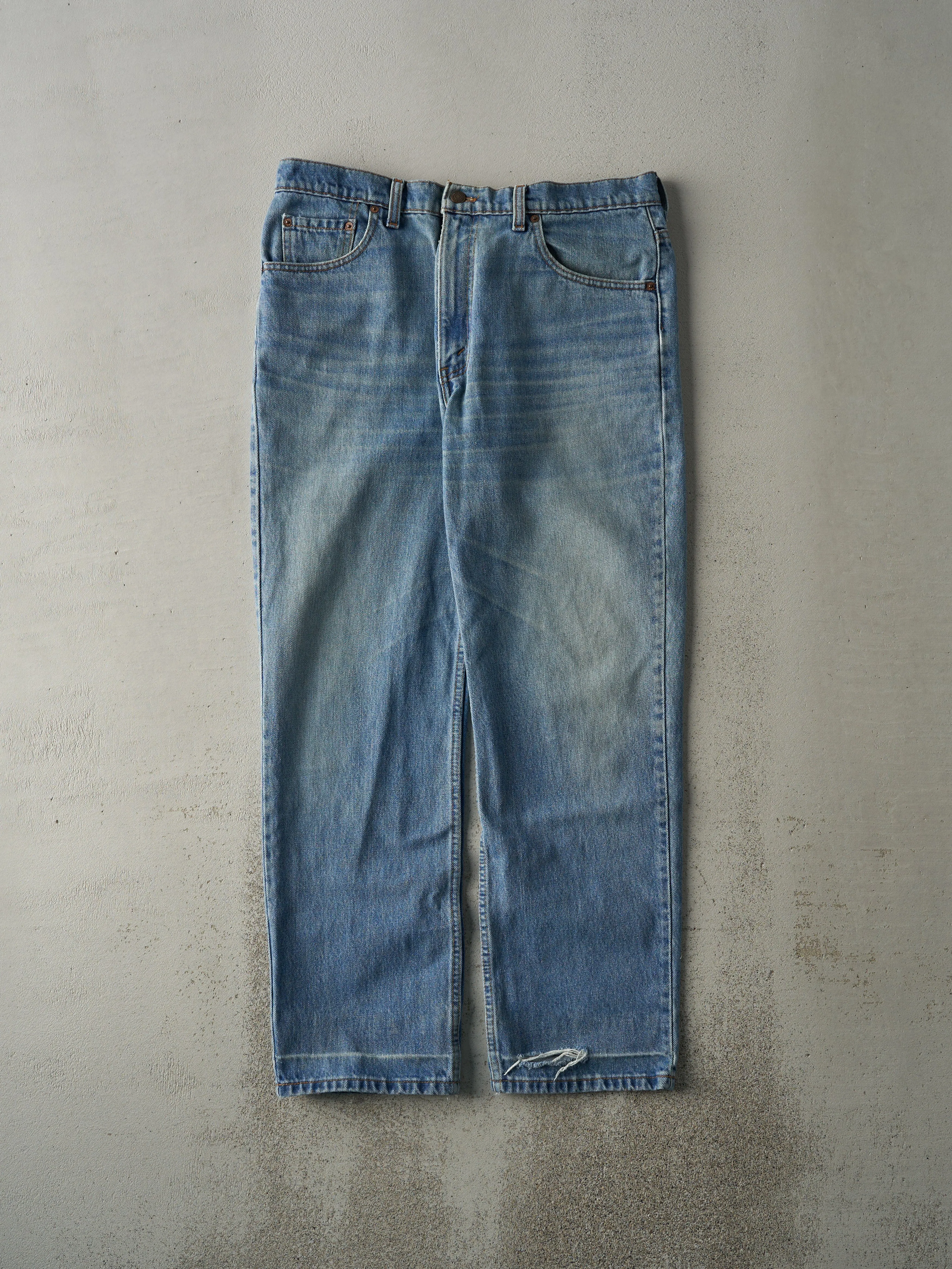 Vintage 90s Light Wash Levi's 516 Jeans (34x30) sold by Rebalance Vintage