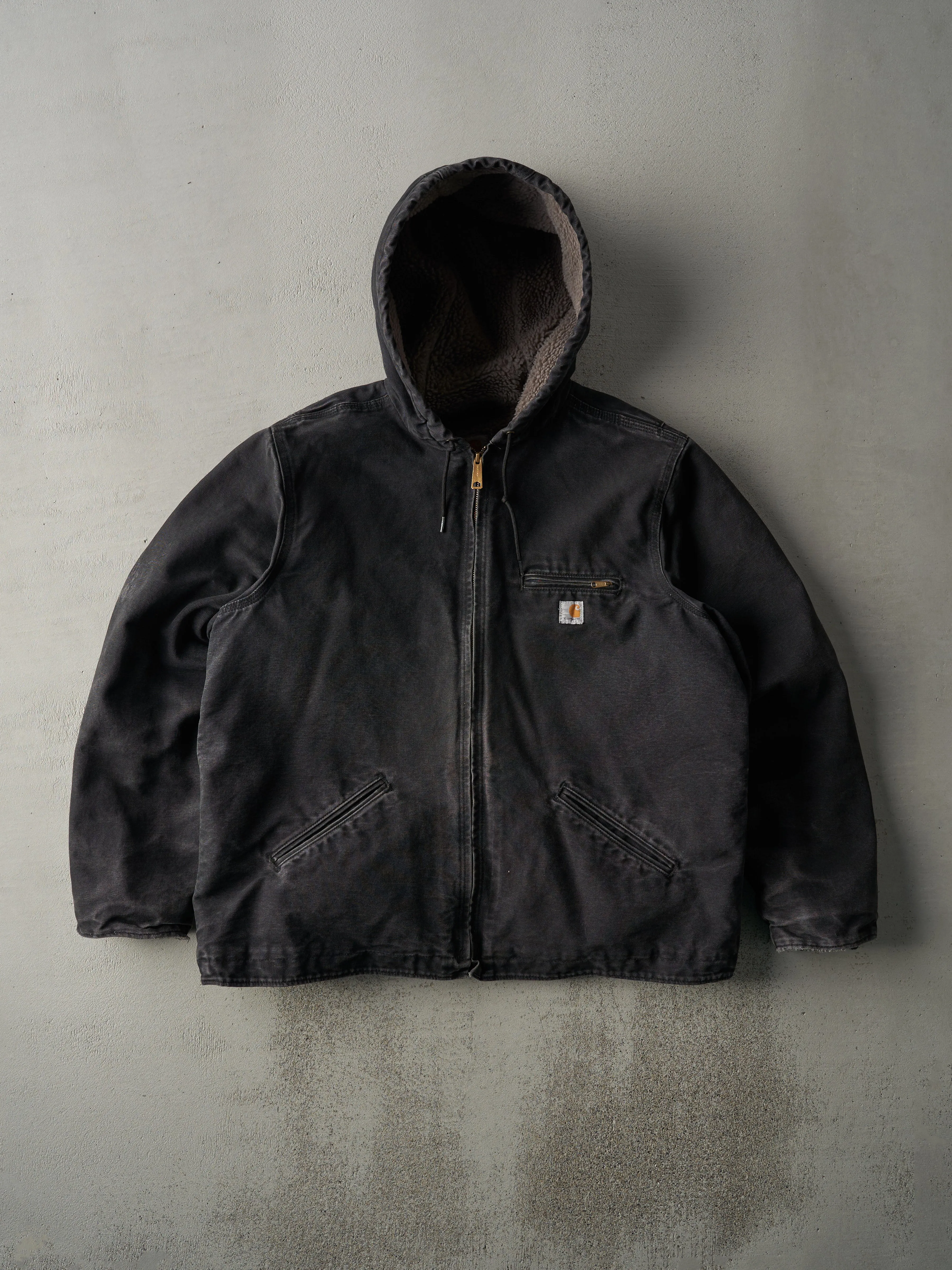 Vintage Y2K Faded Black Sherpa Lined Carhartt Hooded Workwear Jacket (L) sold by Rebalance Vintage