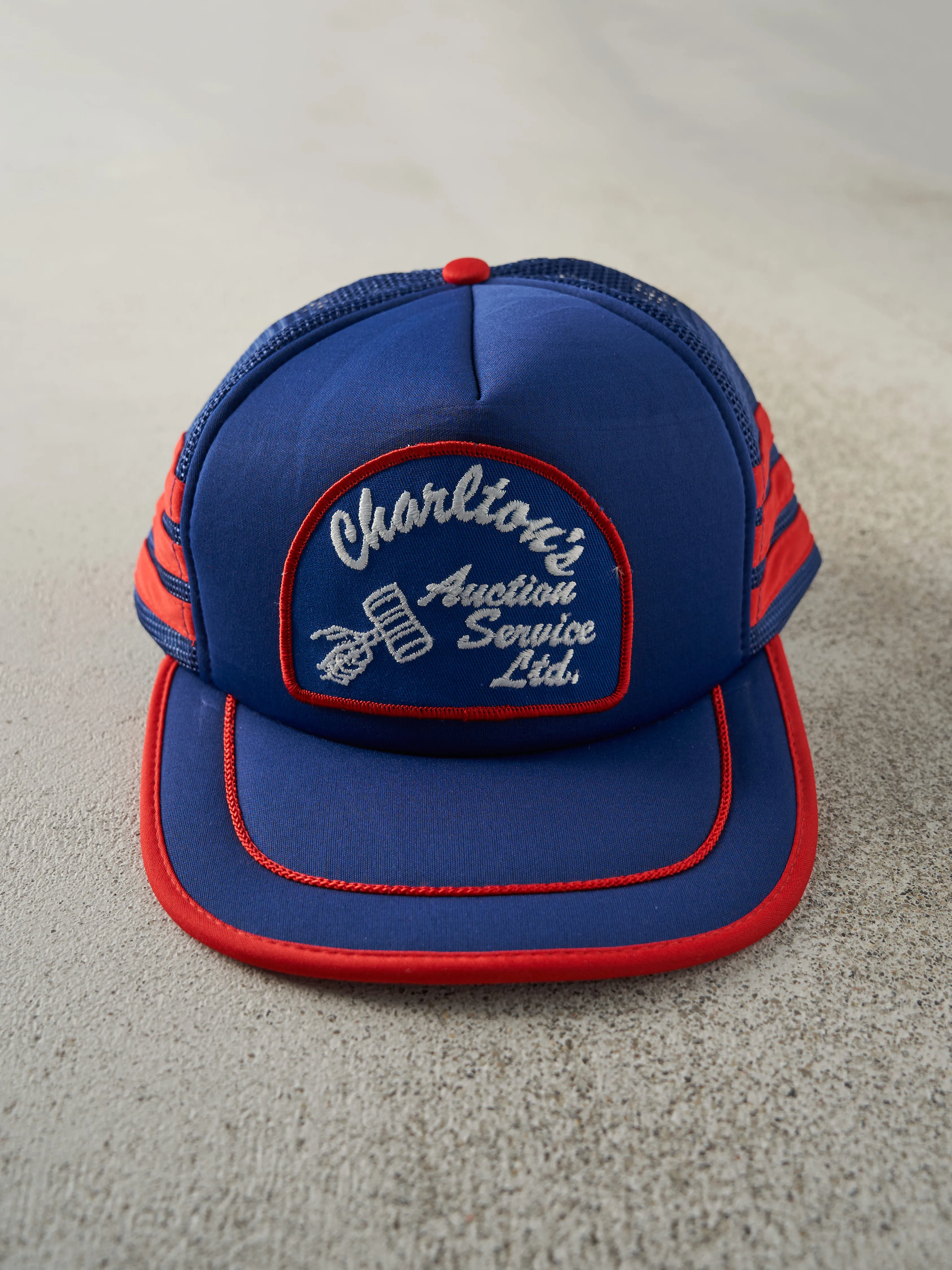 Vintage 80s Blue & Red Auction Services Foam Trucker Hat sold by Rebalance Vintage