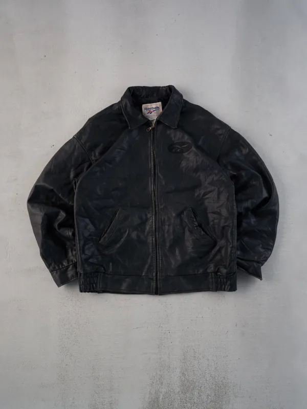 Vintage 90s Black Reebok Collared Leather Jacket (L) sold by Rebalance Vintage