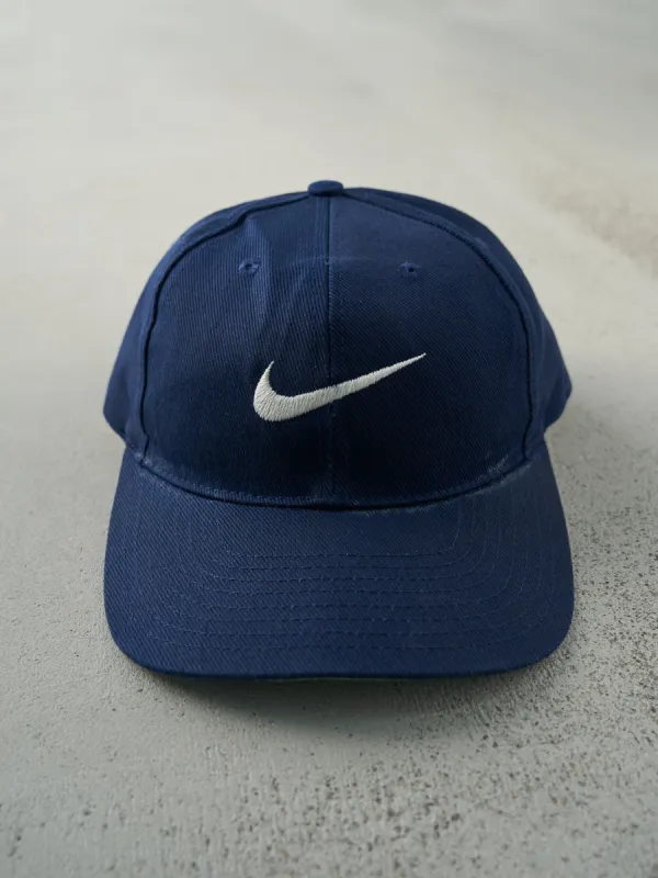 Vintage 90s Navy Blue Embroidered Nike Swoosh Snapback Hat sold by Rebalance Vintage