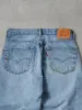 Vintage 90s Light Washed Levi's 550 Denim Jeans (32x29) sold by Rebalance Vintage