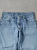 Vintage 90s Light Washed Levi's 550 Denim Jeans (32x29) sold by Rebalance Vintage