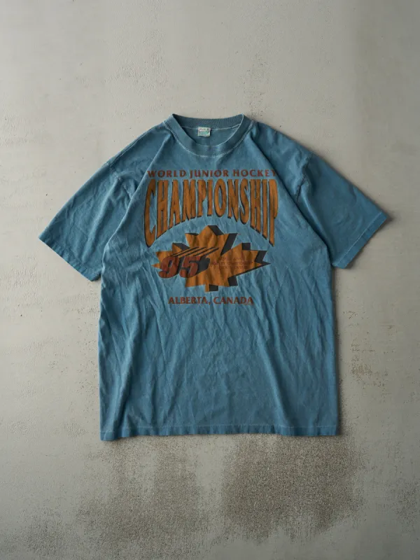 Vintage 95' Slate Blue World Jr. Hockey Champion Tee (L) sold by Rebalance Vintage