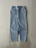 Vintage 90s Light Wash Levi's 501 Embossed Jeans (32x29) sold by Rebalance Vintage