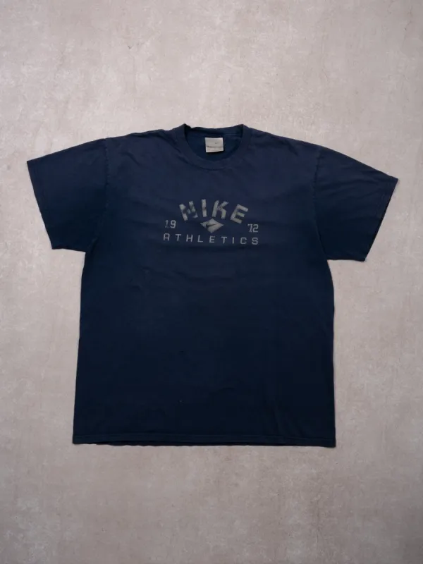Vintage Y2K Navy Blue 1972 Nike Athletics Tee (M/L) sold by Rebalance Vintage