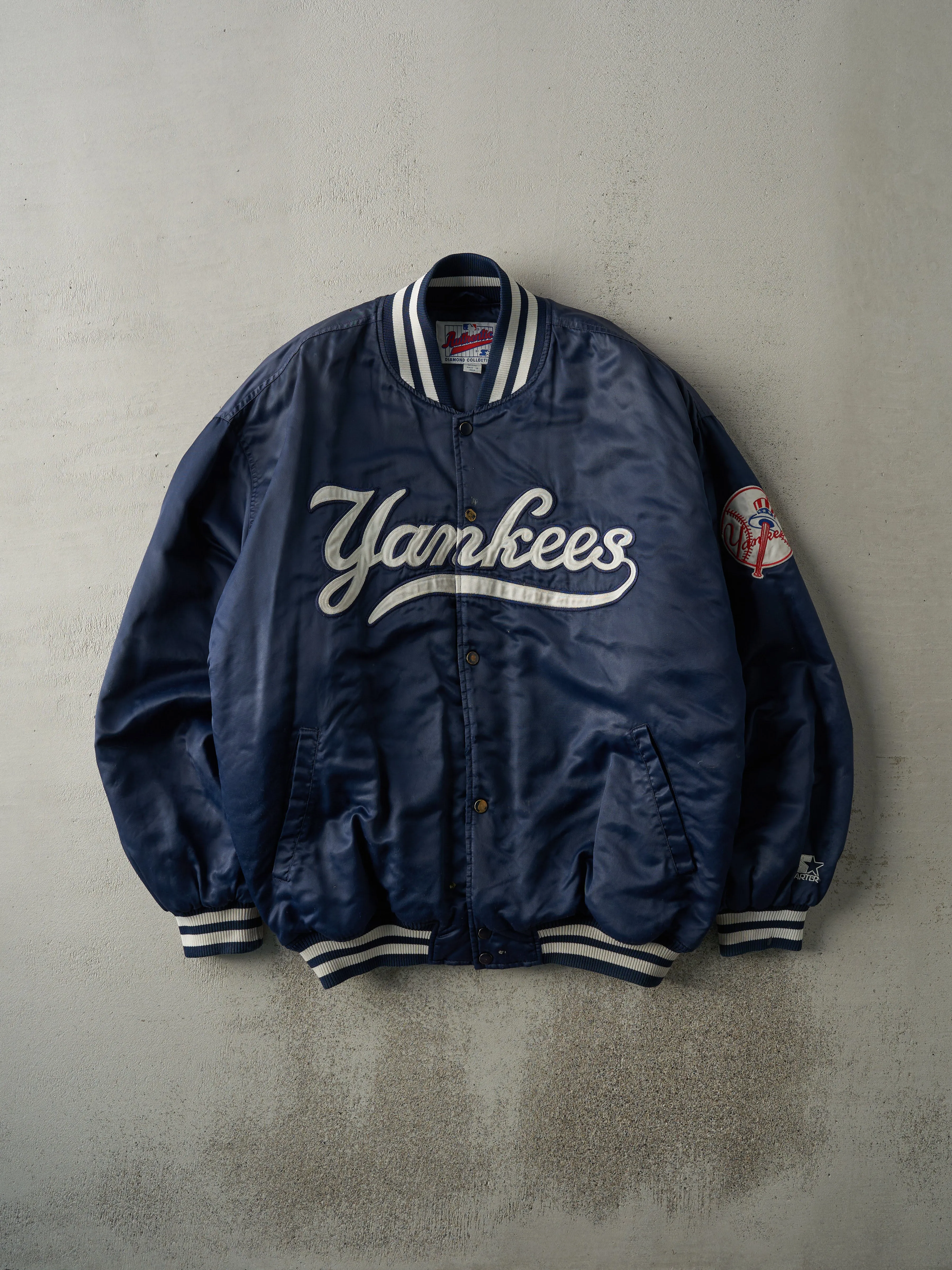 Vintage 90s Navy Blue Yankee Starter Satin Bomber Jacket (XXL) sold by Rebalance Vintage