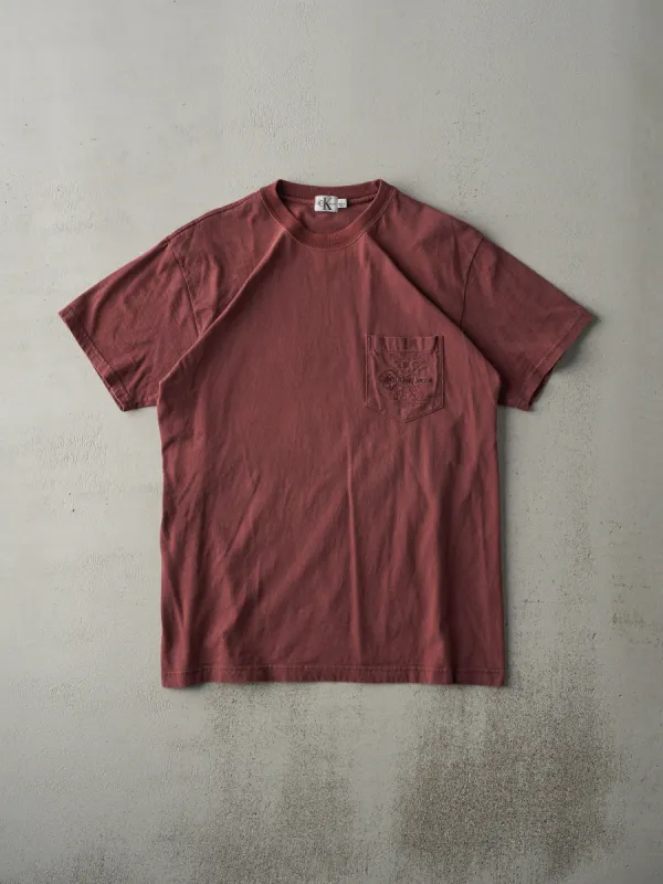 Vintage 90s Burgundy Calvin Klein Jeans Embroidered Pocket Tee (M) sold by Rebalance Vintage