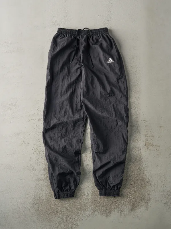 Vintage 90s Black Embroidered Adidas Windbreaker Pants (26x30) sold by Rebalance Vintage