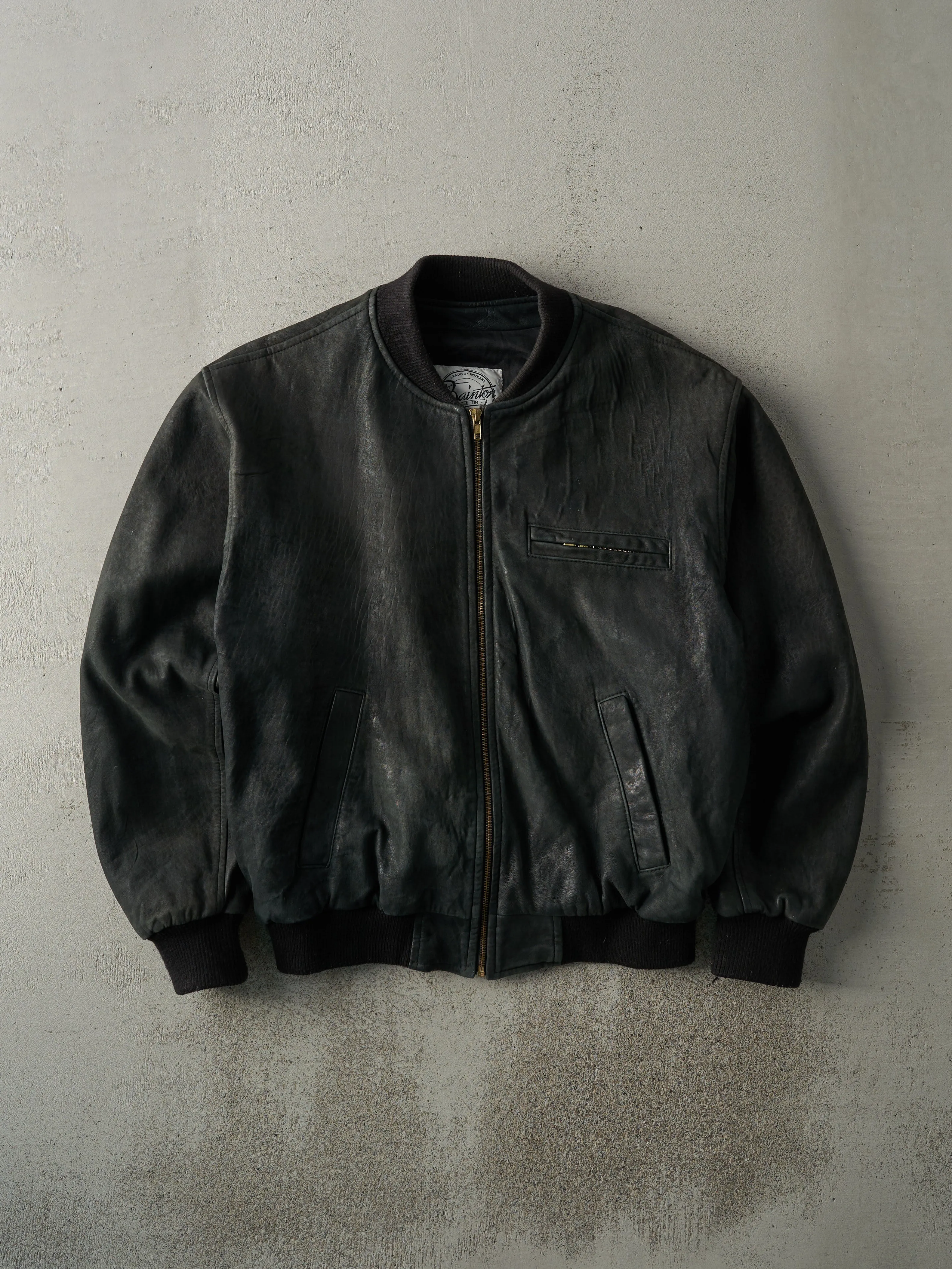 Vintage 80s Black Bainton Leather Bomber Jacket (M) sold by Rebalance Vintage