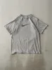 Vintage 90s Grey Nike Swoosh Tee (S/M) sold by Rebalance Vintage