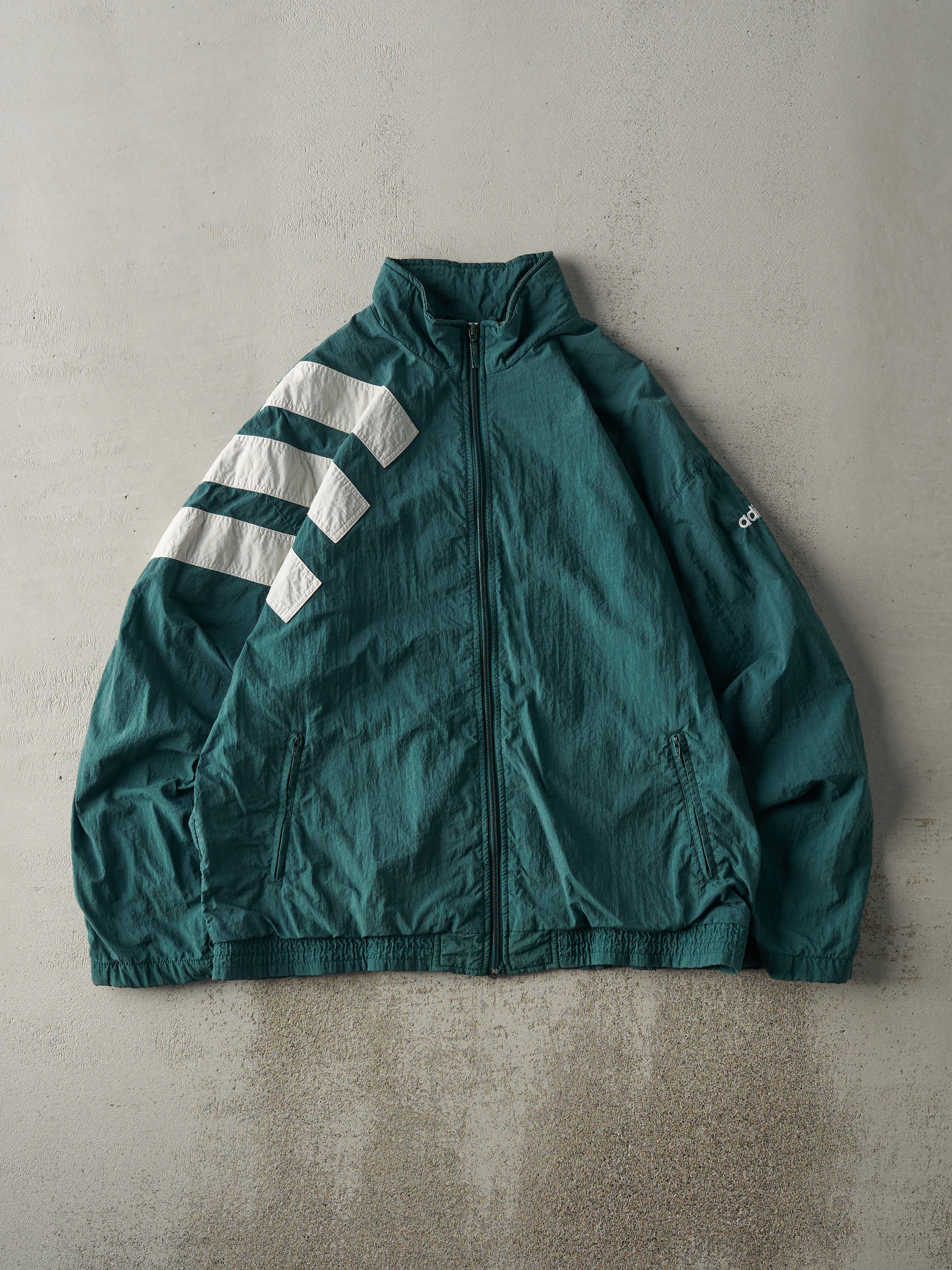 Vintage 90s Green Adidas Windbreaker Jacket (L) sold by Rebalance Vintage