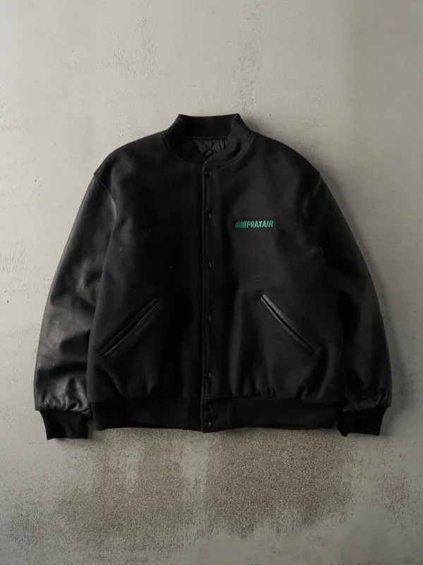 Vintage 90s Black Embroidered Praxair Varsity Jacket (XXL) sold by Rebalance Vintage