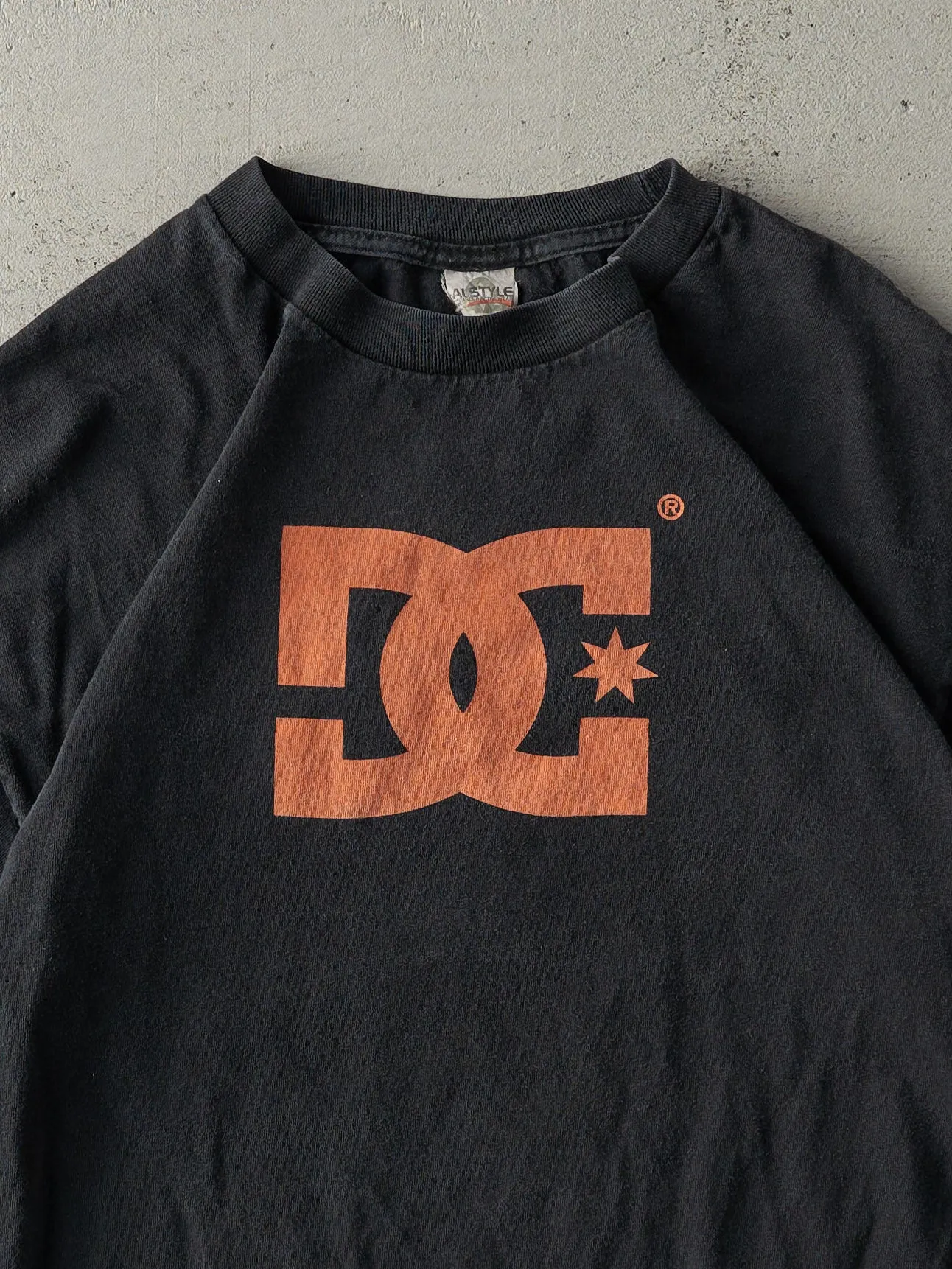 Vintage Y2K Faded Black & Orange DC Shoes Tee (M) sold by Rebalance Vintage product image thumbnail 2