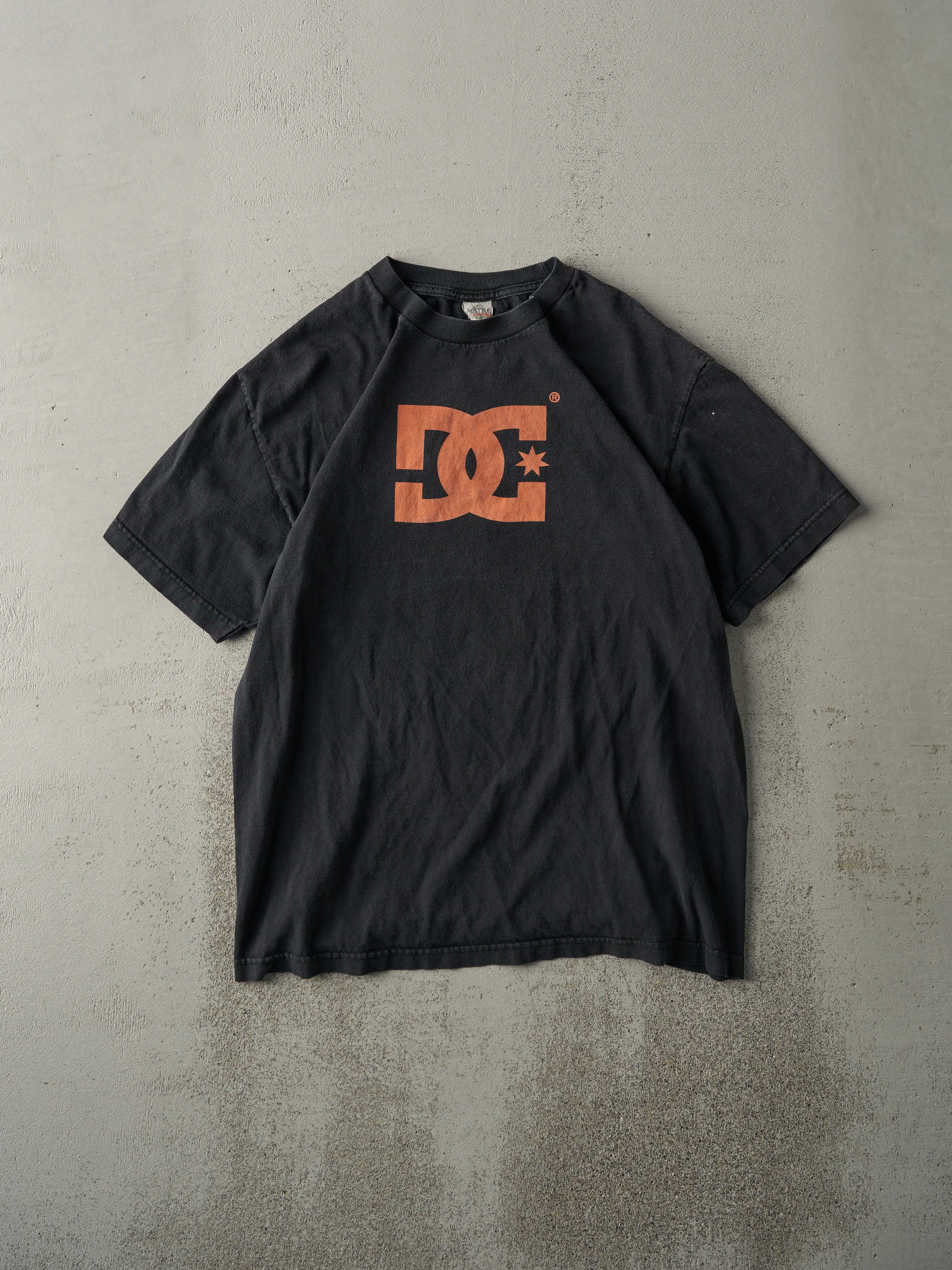 Vintage Y2K Faded Black & Orange DC Shoes Tee (M) sold by Rebalance Vintage