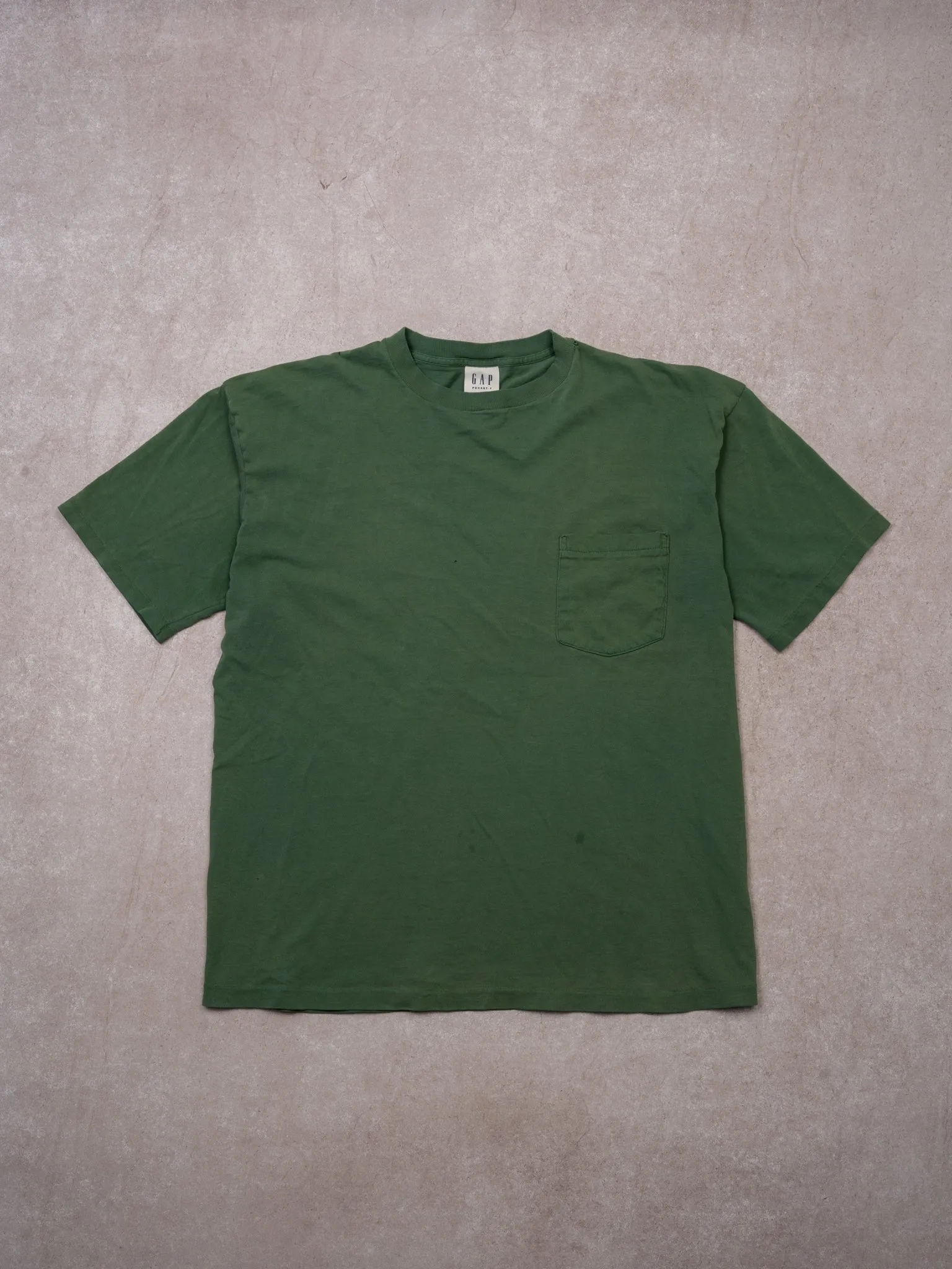 Vintage 90s Green Gap Blank Pocket Single Stitch tee (M) sold by Rebalance Vintage