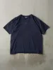 Vintage 90s Navy Blue Nike Swoosh Logo Tee (L) sold by Rebalance Vintage