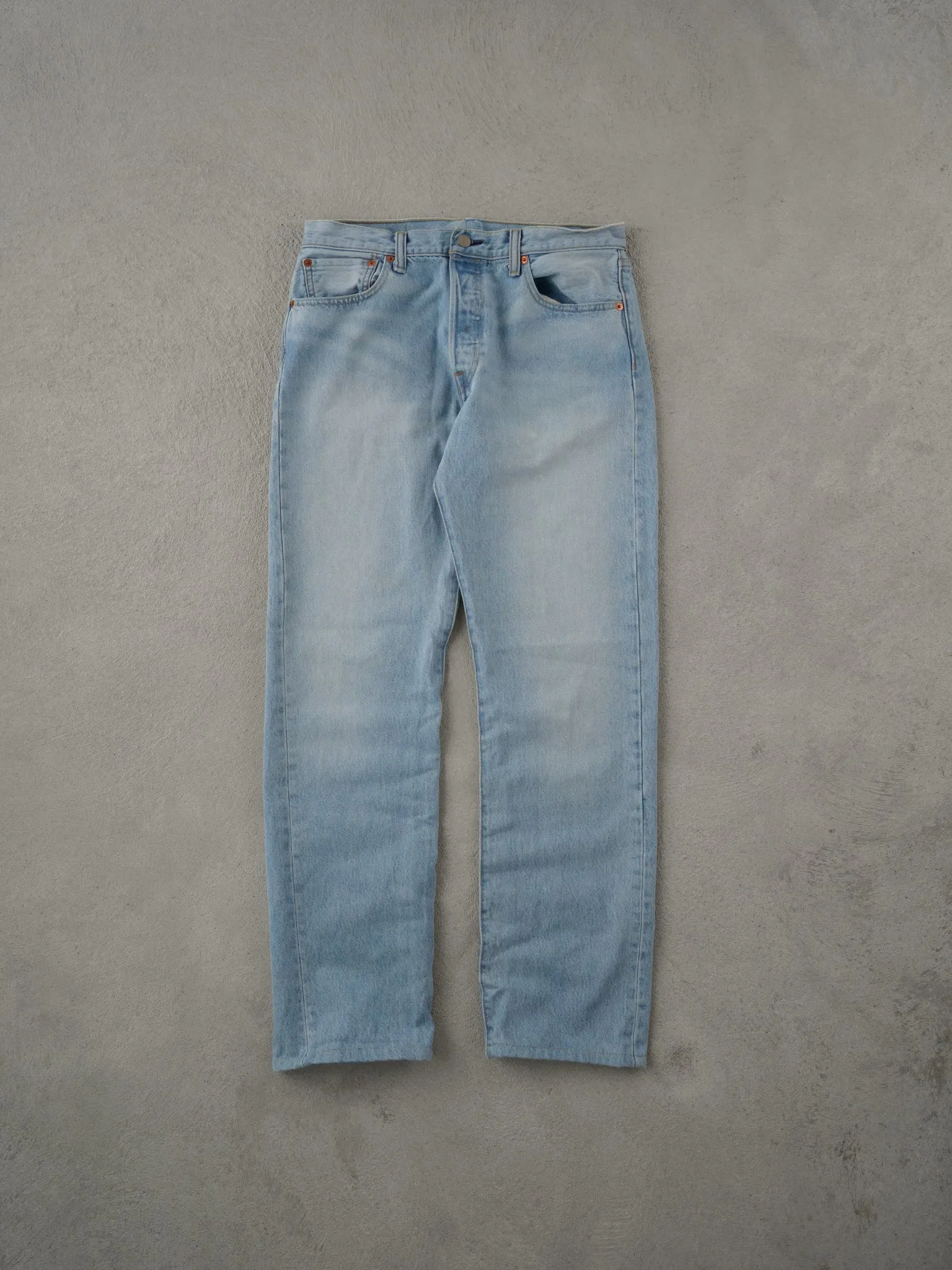 Vintage 90s Light Washed Blue Levi's 501 Denim Jeans (34x31) sold by Rebalance Vintage