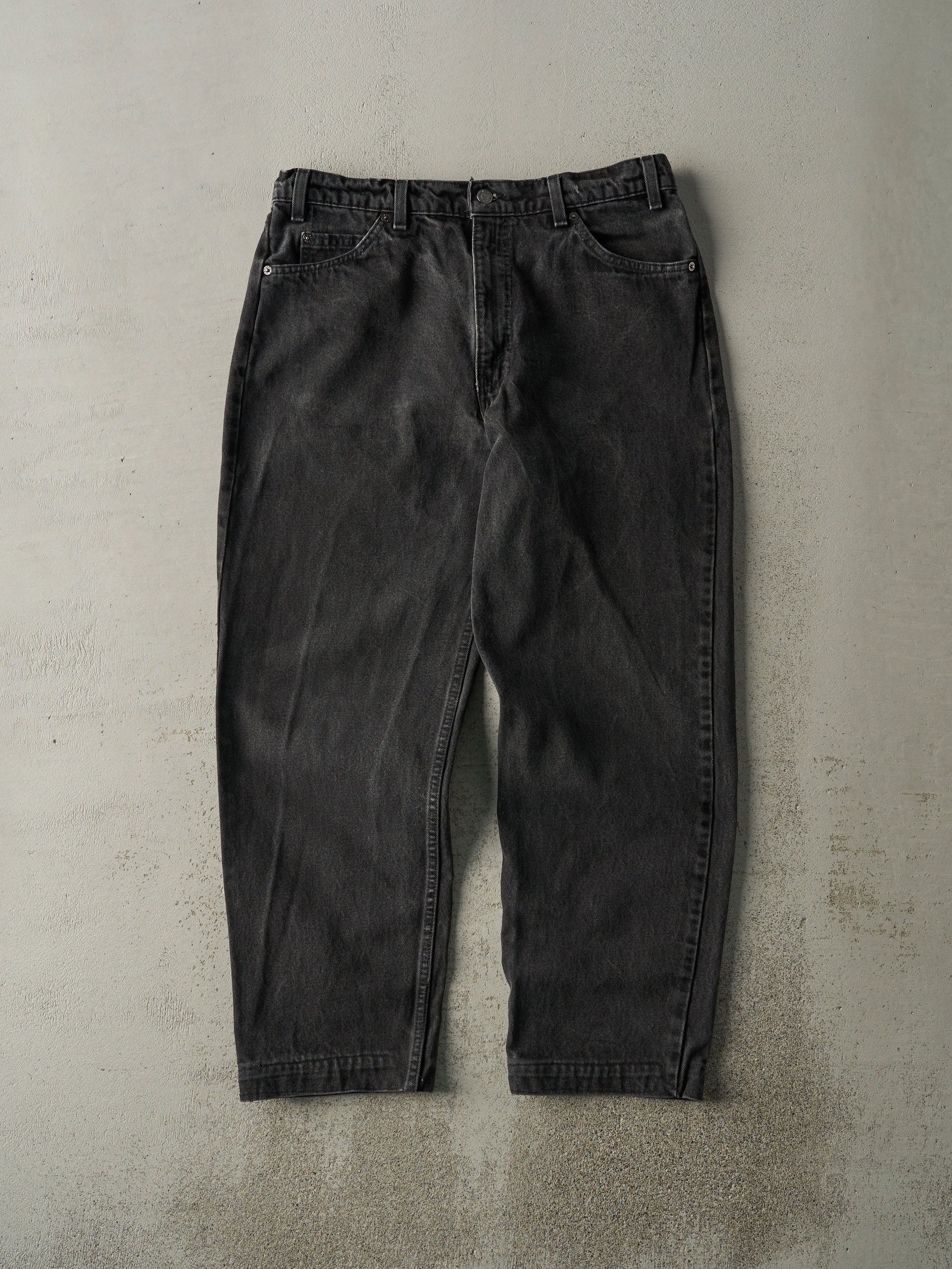 Vintage 90s Black Levi's 550 Orange Tab Denim Pants (34x28.5) sold by Rebalance Vintage