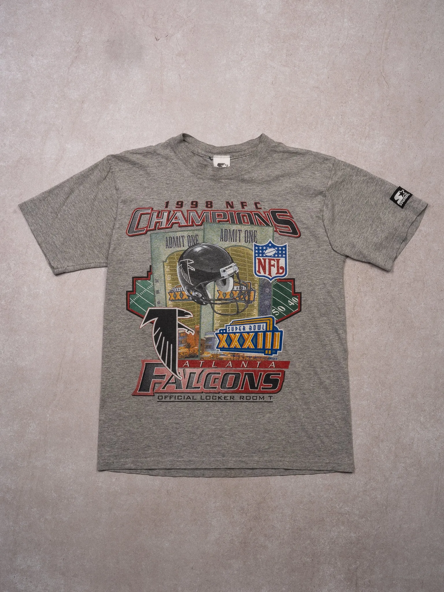 Vintage '98 Atlanta Falcons NFC Champs XXXIII x Starter Tee (S/M) sold by Rebalance Vintage