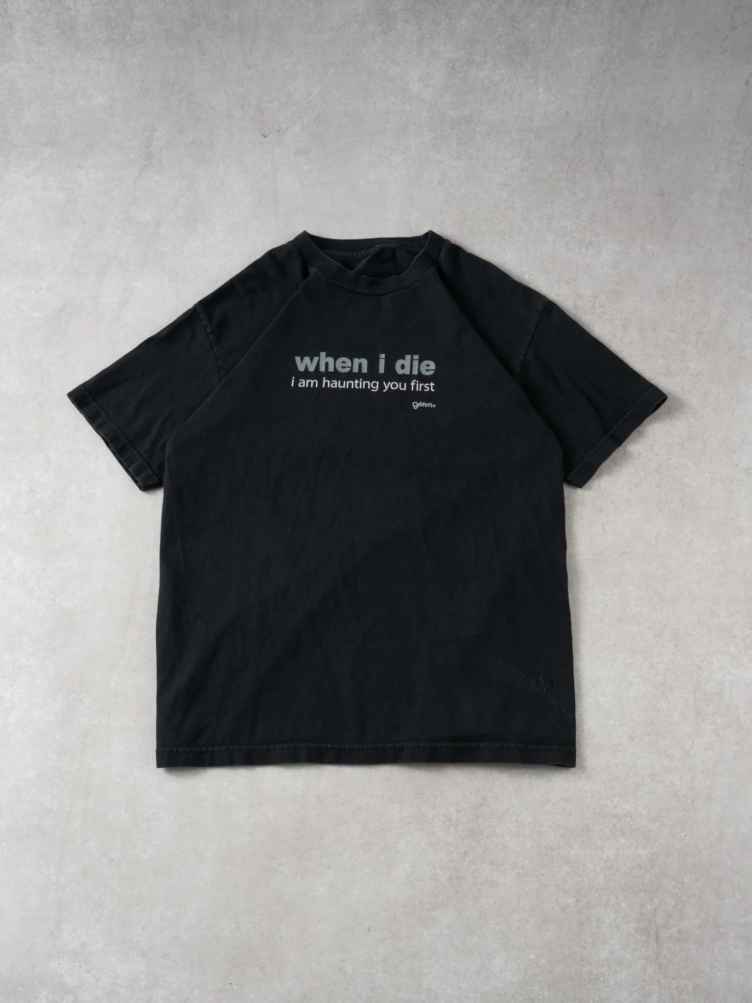 Vintage 90s Washed Black "When I Die I Am Haunting You First" Tee (M) sold by Rebalance Vintage