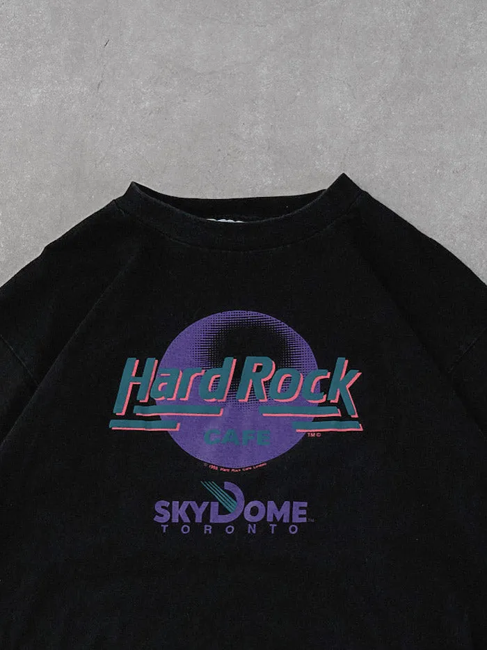 Vintage 89' Black HardRock Cafe Skydome Toronto Graphic Tee (M/L) sold by Rebalance Vintage product image thumbnail 2