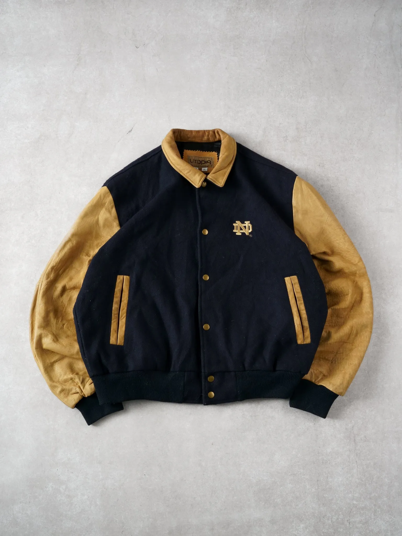 Vintage 90s Navy Blue Notre Dame Collared Varsity Jacket (L/XL) sold by Rebalance Vintage