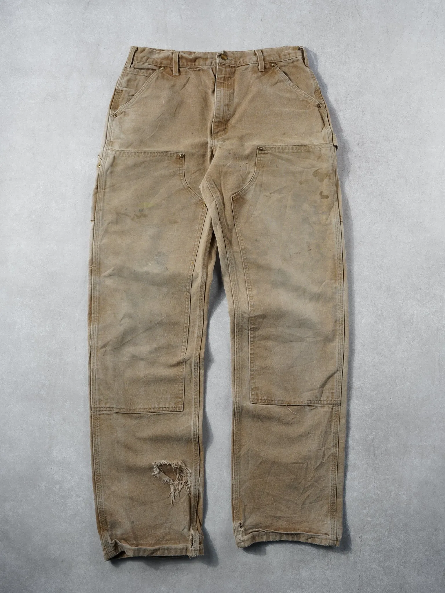 Vintage 90s Khaki Carhartt Dungeree Fit Distressed Double Knee Carpenter Pants (32x34) sold by Rebalance Vintage